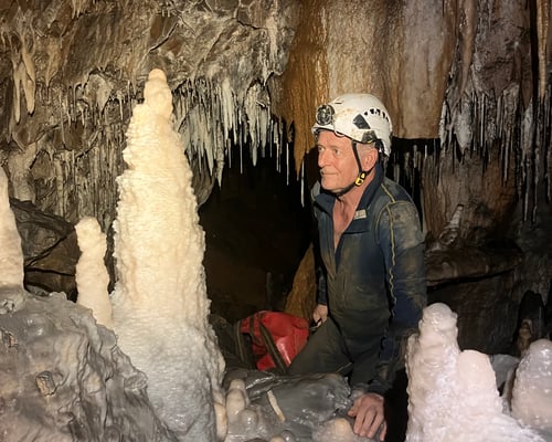 Caver amongst formations in Retdung Khur, Meghalaya